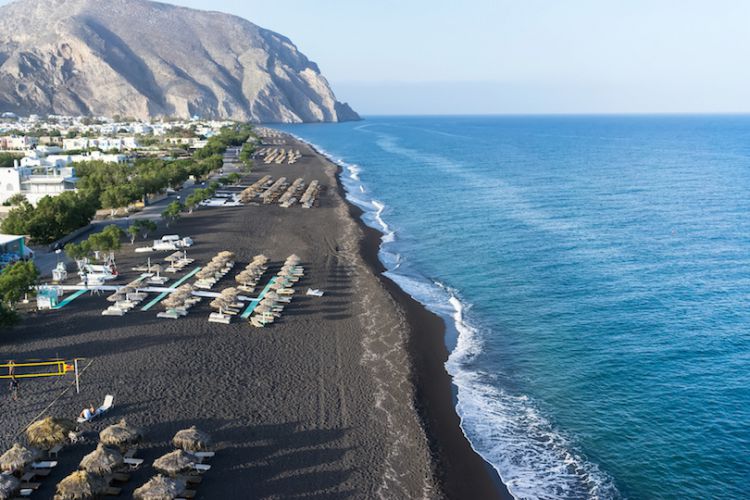 Perissa among the top 10 black sand beaches of the world